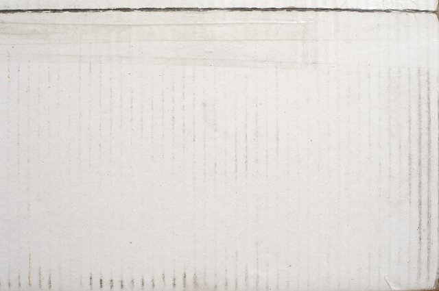 Used old white cardboard background texture with a taped join at the top and dirty ribbed lines on the white surface