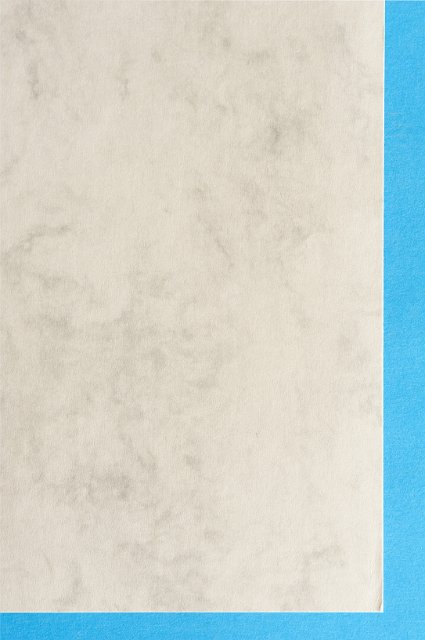 marbled paper with a contrasting blue border