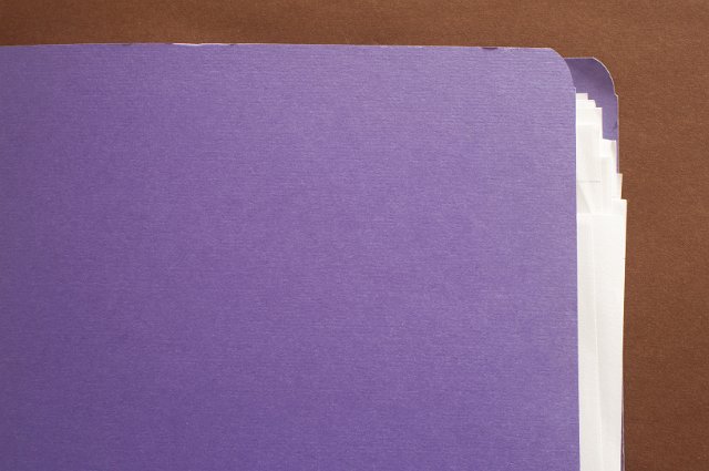 document folder with documents overlapping at the side, space to insert your own text