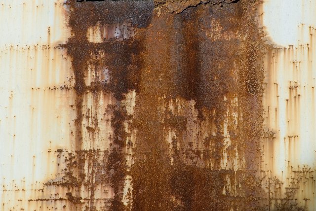 rusty stained orange metal