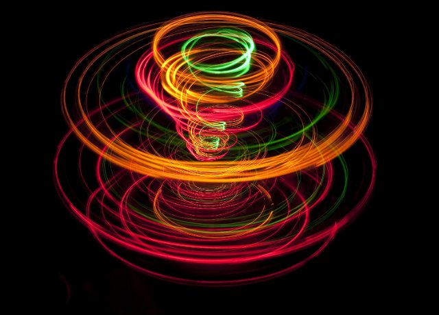 and expanding spiral of colored light